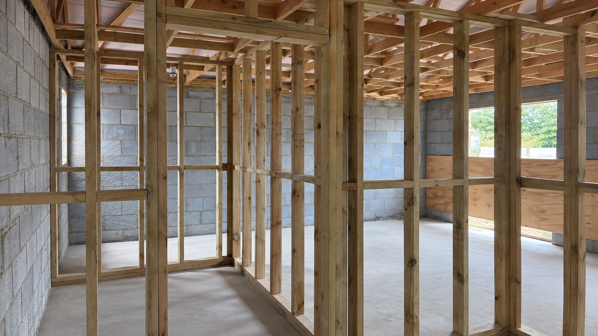 Timber stud partitions framed inside a new block shell
